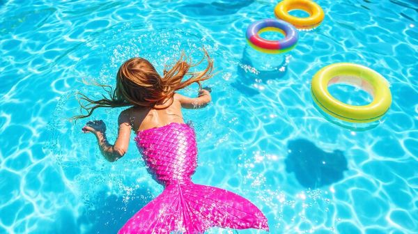 Dive into fun with colorful pink mermaid tails for swimming