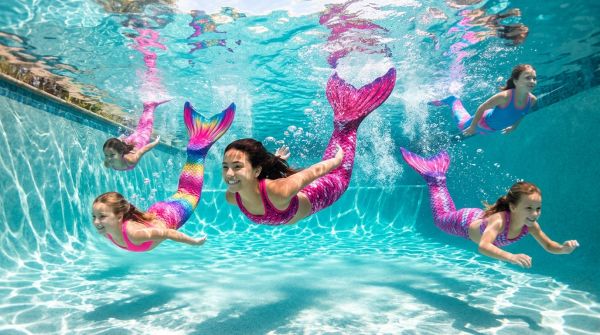 Dive into fun with colorful pink mermaid tails for swimming